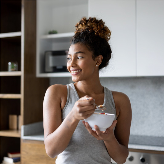 woman eating yogurt