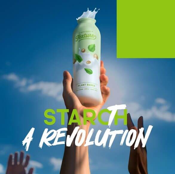 Hand holding a bottle of plant-based milk with the text