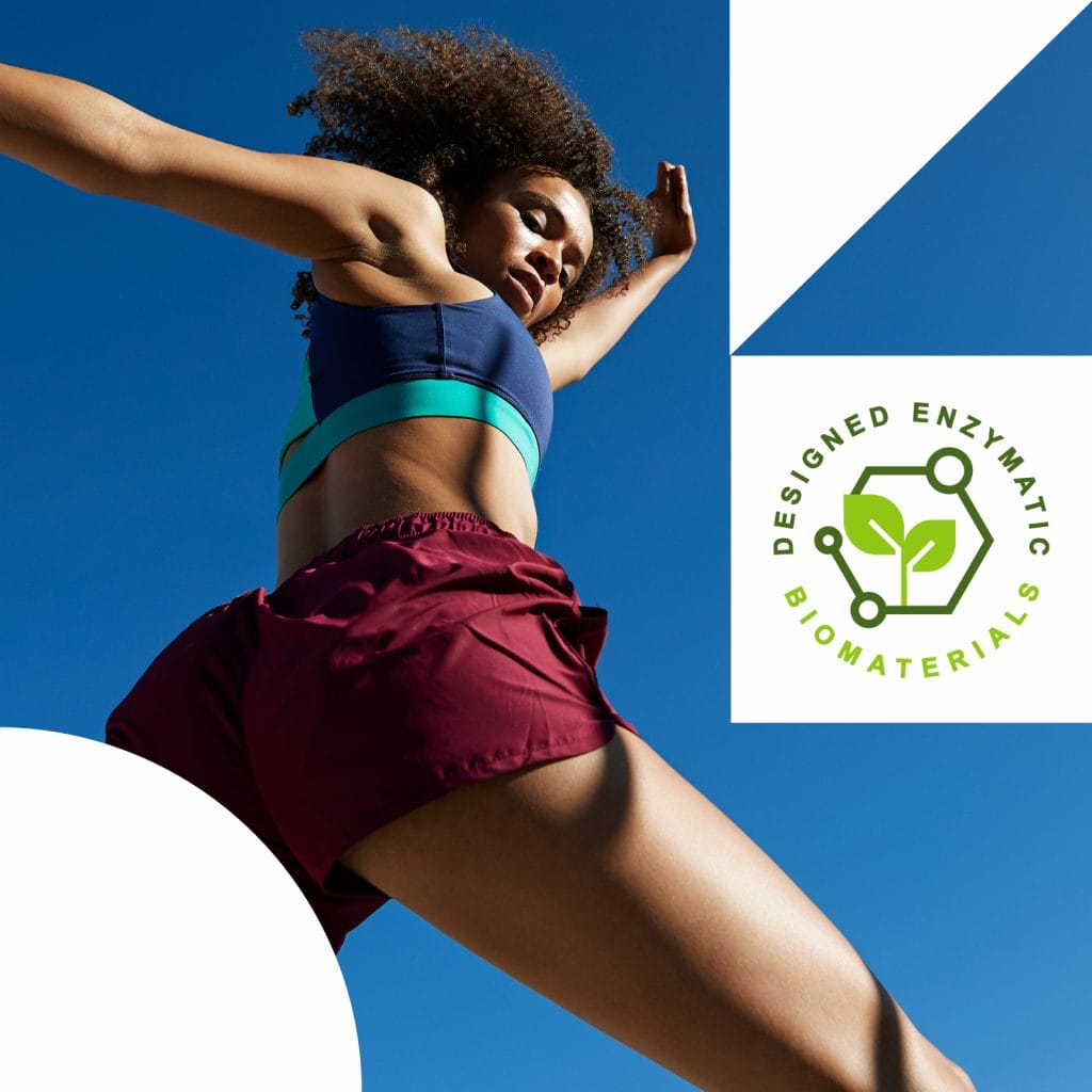 A female in athletic attire jumps energetically against a clear blue sky, with the DEB logo in the top right corner.
