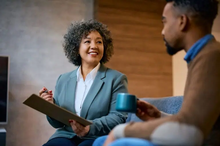 happy-financial-advisor-having-a-meeting-with-her-2023-11-27-05-02-21-utc